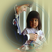 Nurse and child - Photograph: Fred Cattroll