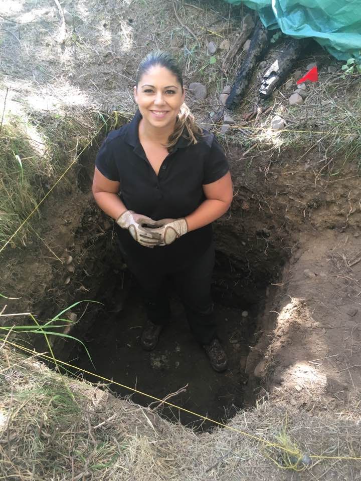 Archaeologist Sarah Beaulieu excavating at the Morrissey Internment Camp in July 2017.