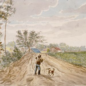 Un homme et un chien marchant le long d'une route