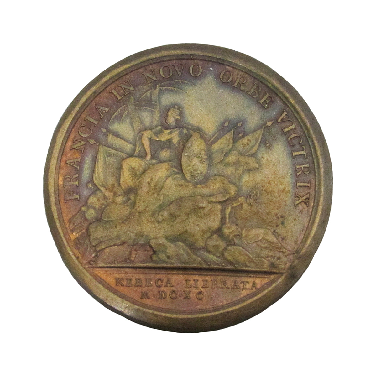 Une médaille de bronze avec l'image d'une femme montant un cheval, conservée au Musée canadien de l'histoire à Ottawa.