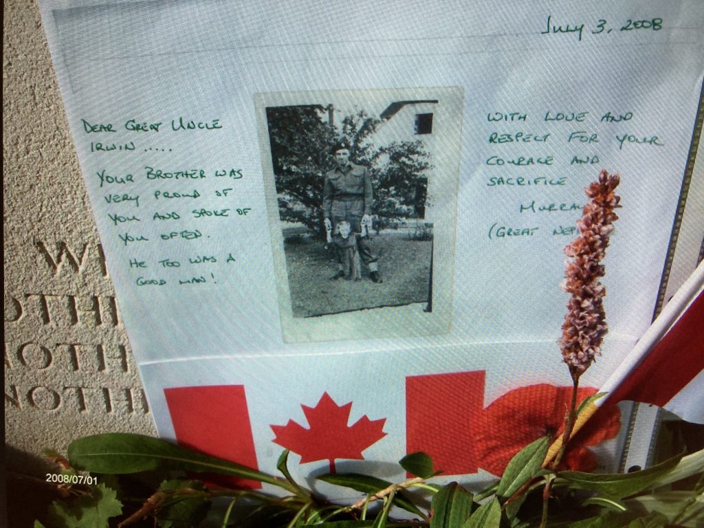 A gravesite with a photo of